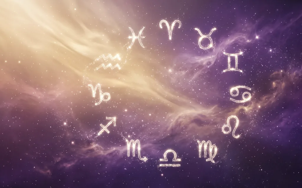 Símbolos do zodíaco brilhantes sobre um fundo cósmico em tons de dourado e roxo representativos do horóscopo de hoje.